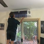 Man Checking on Air Condition — Air Conditioning in Nightcliff, NT